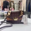 Designer Handbags – Loume & Nicole Miller